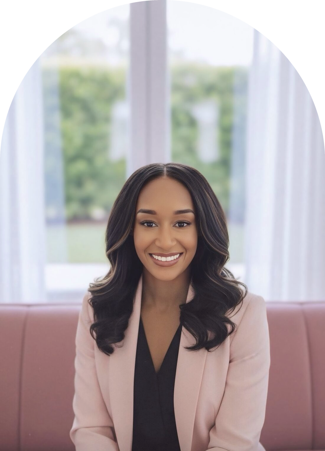 Patricia Smith, founder of Katcher AI, seated in a warm arch-framed portrait.